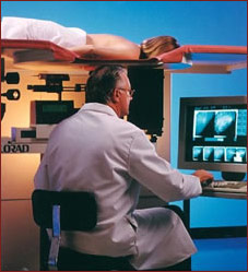 The radiologist uses ultrasound to locate the area for biopsy and to direct the needle used in collecting breast tissue samples.